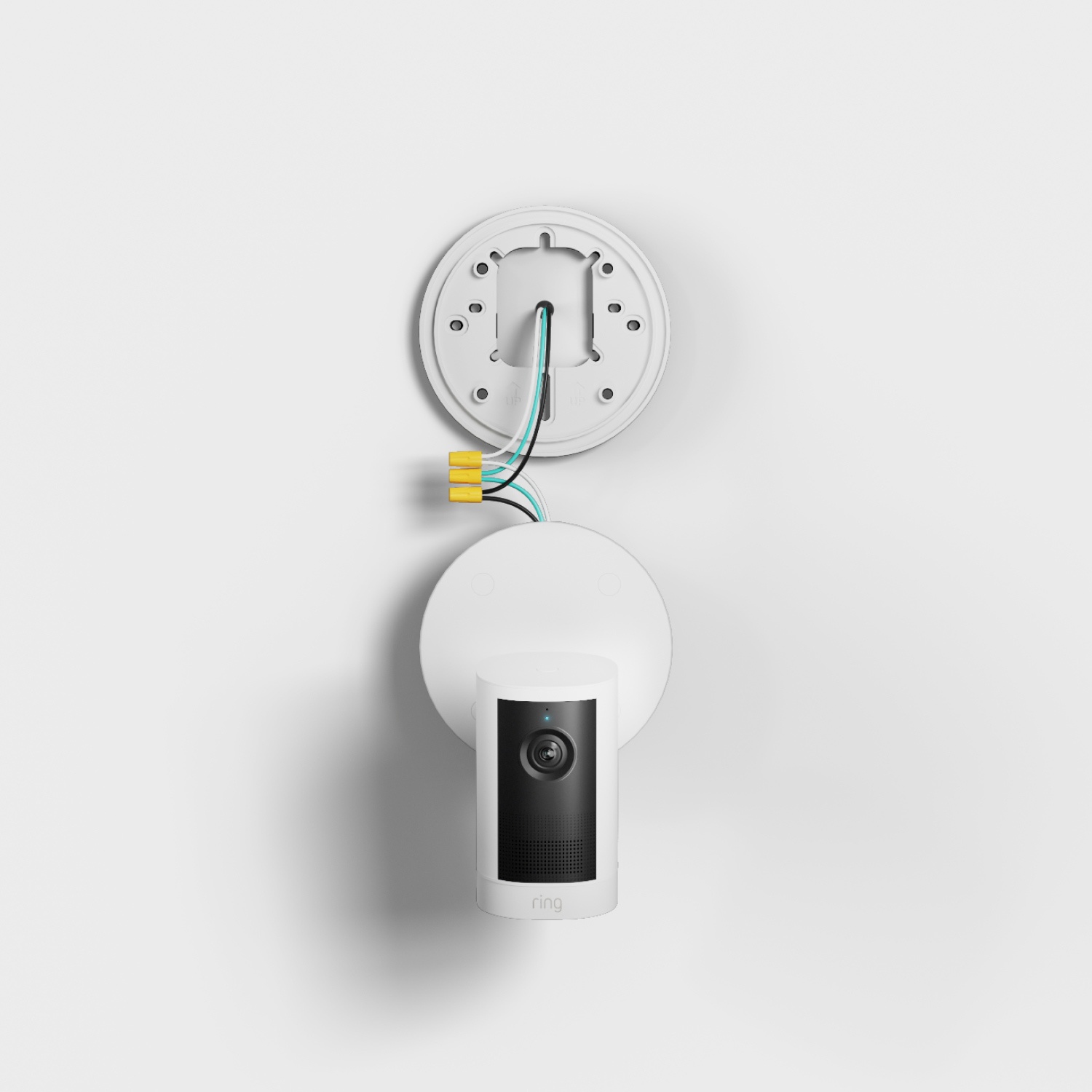 Outdoor Cam 4K Plus  - Wired:White Ring security camera mounted on a wall with exposed wiring and round base plate against a clean, minimalist background.