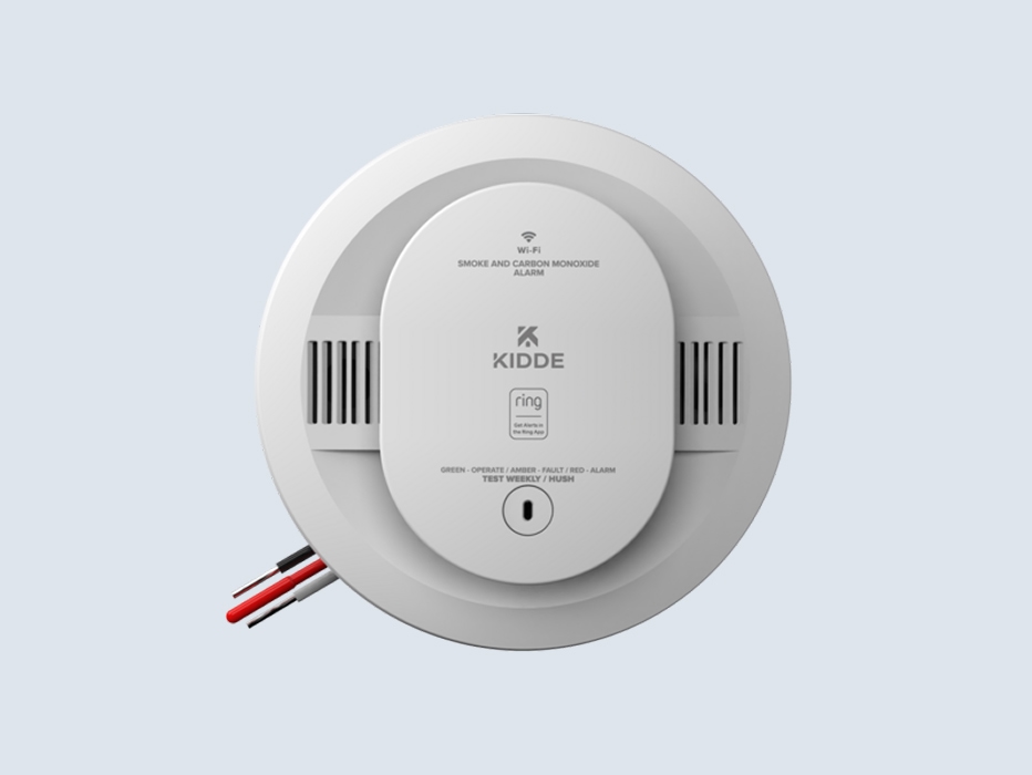 KIDDE Smart Smoke & Carbon Monoxide Alarm shown over a grey background.
