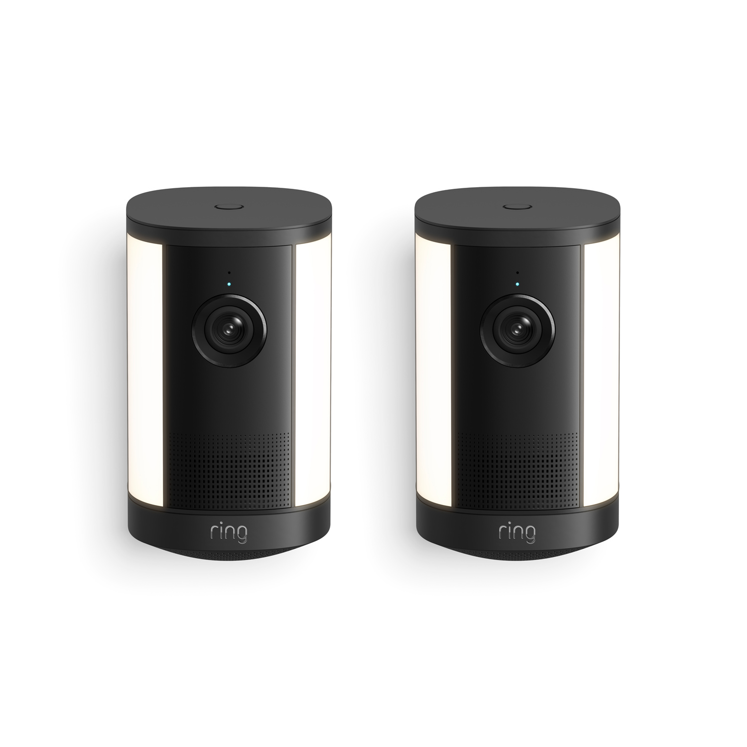 Spotlight Cam 4K Plus - Pair of black Ring outdoor cameras with cylindrical design, front lenses, LED status lights, and side light panels on a white background.