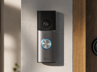 Wired Video Doorbell 3rd Gen mounted to a concrete grey wall beside wooden doorframe