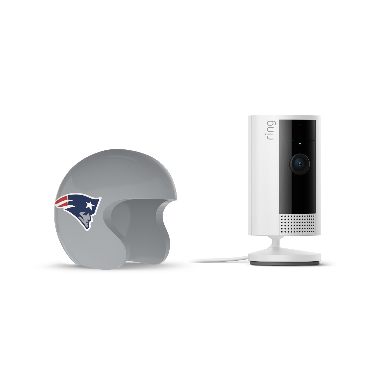 Indoor Cam, White + NFL Game Day Cam Cover — AFC - White Ring indoor camera on a stand beside a gray football helmet with the New England Patriots logo on a white background.