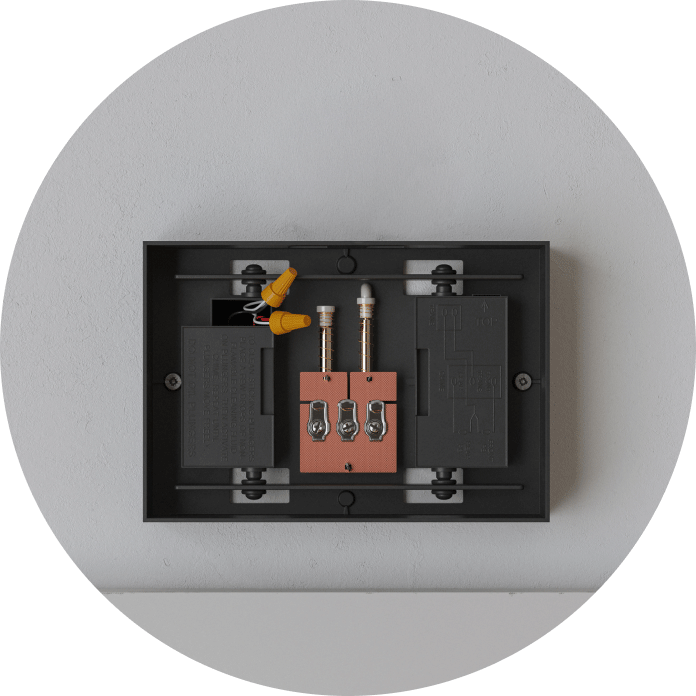 Image shows a doorbell installation mounting bracket with various connection points.