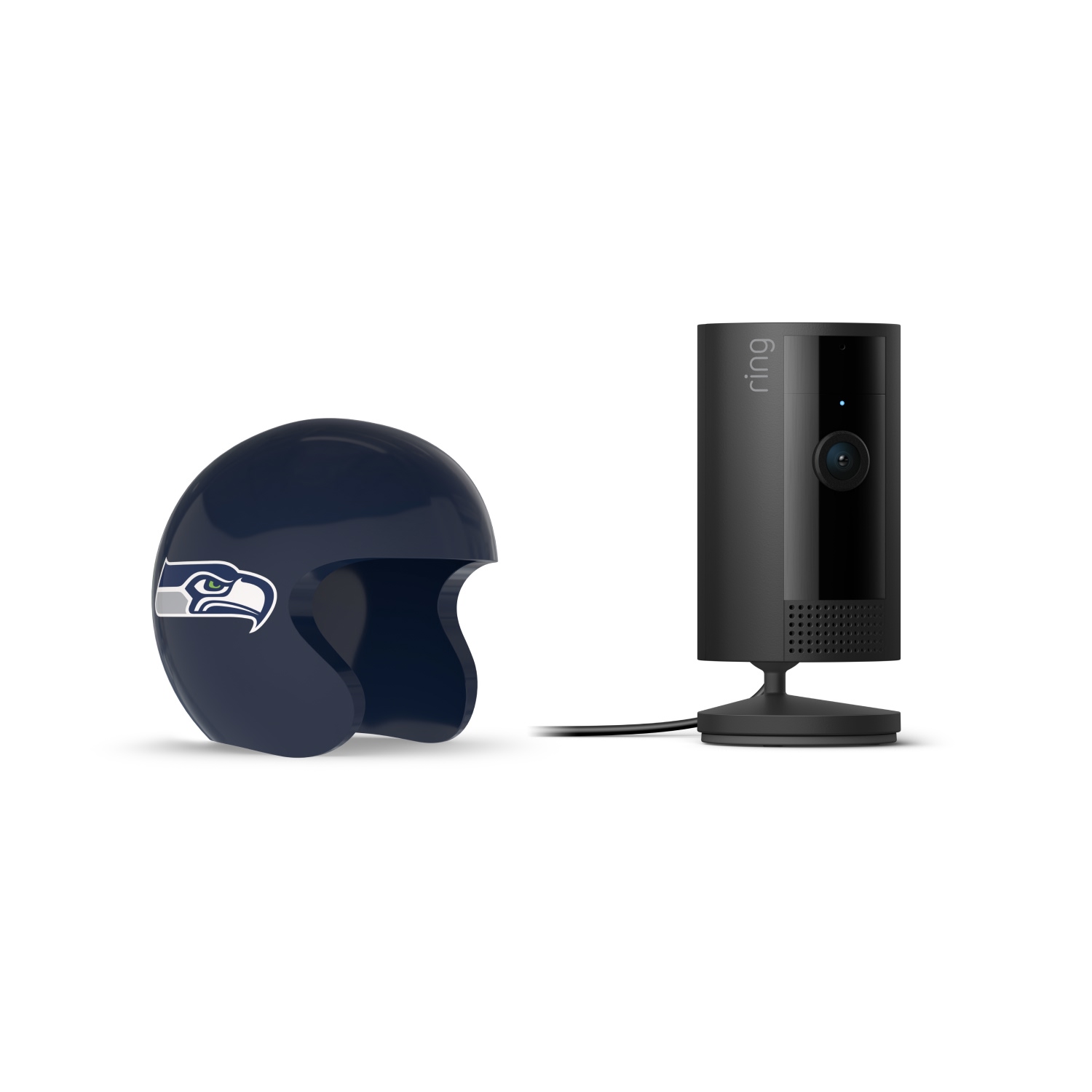 Indoor Cam, Black + NFL Game Day Cam Cover — NFC - Black Ring indoor camera on a stand beside a navy mini football helmet with a hawk logo, set against a white background.
