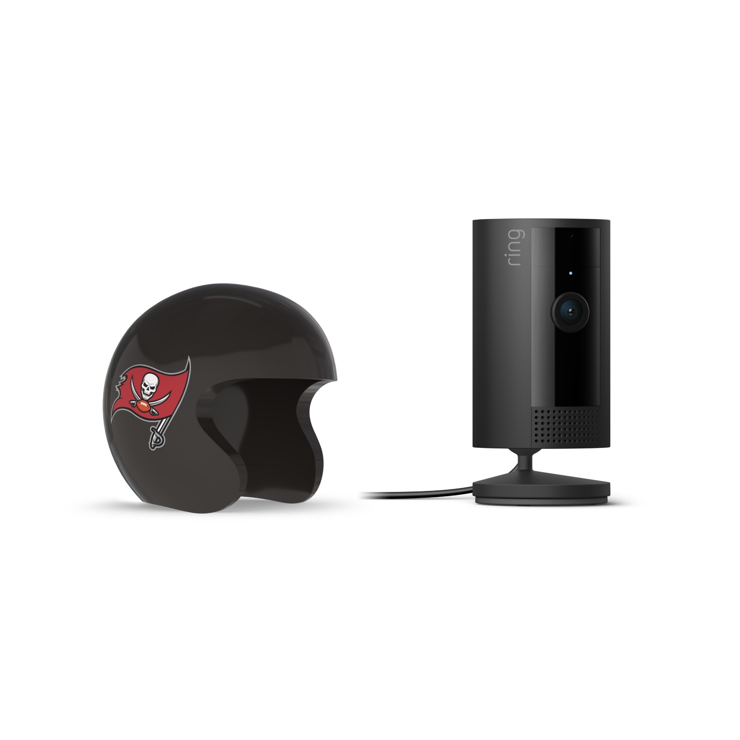 Indoor Cam, Black + NFL Game Day Cam Cover — NFC - Black Ring indoor camera on a stand next to a small black football helmet with a red pirate-flag logo on white background.