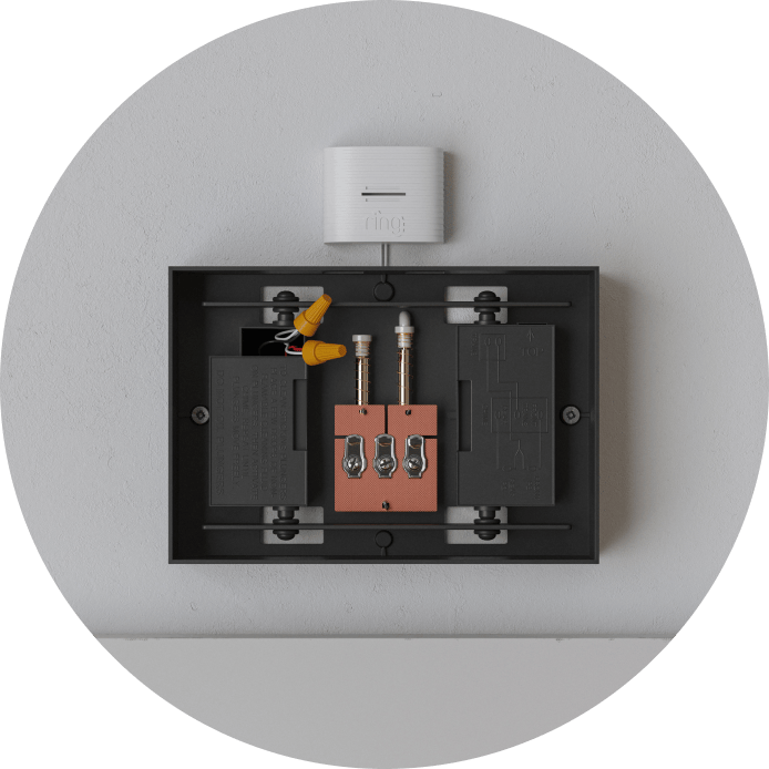 Image shows a doorbell installation mounting bracket with various connection points.