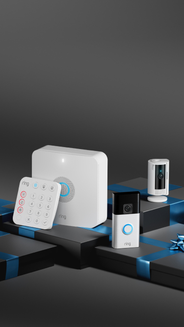 Multiple Ring products like Alarm Keypad, Video Doorbell, and multiple cameras on gift wrapped packages. 
