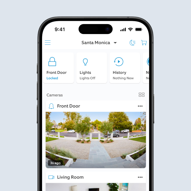 Smartphone screen displaying Ring app dashboard, showing live camera feeds of the Front Door, Driveway, and Living Room. 