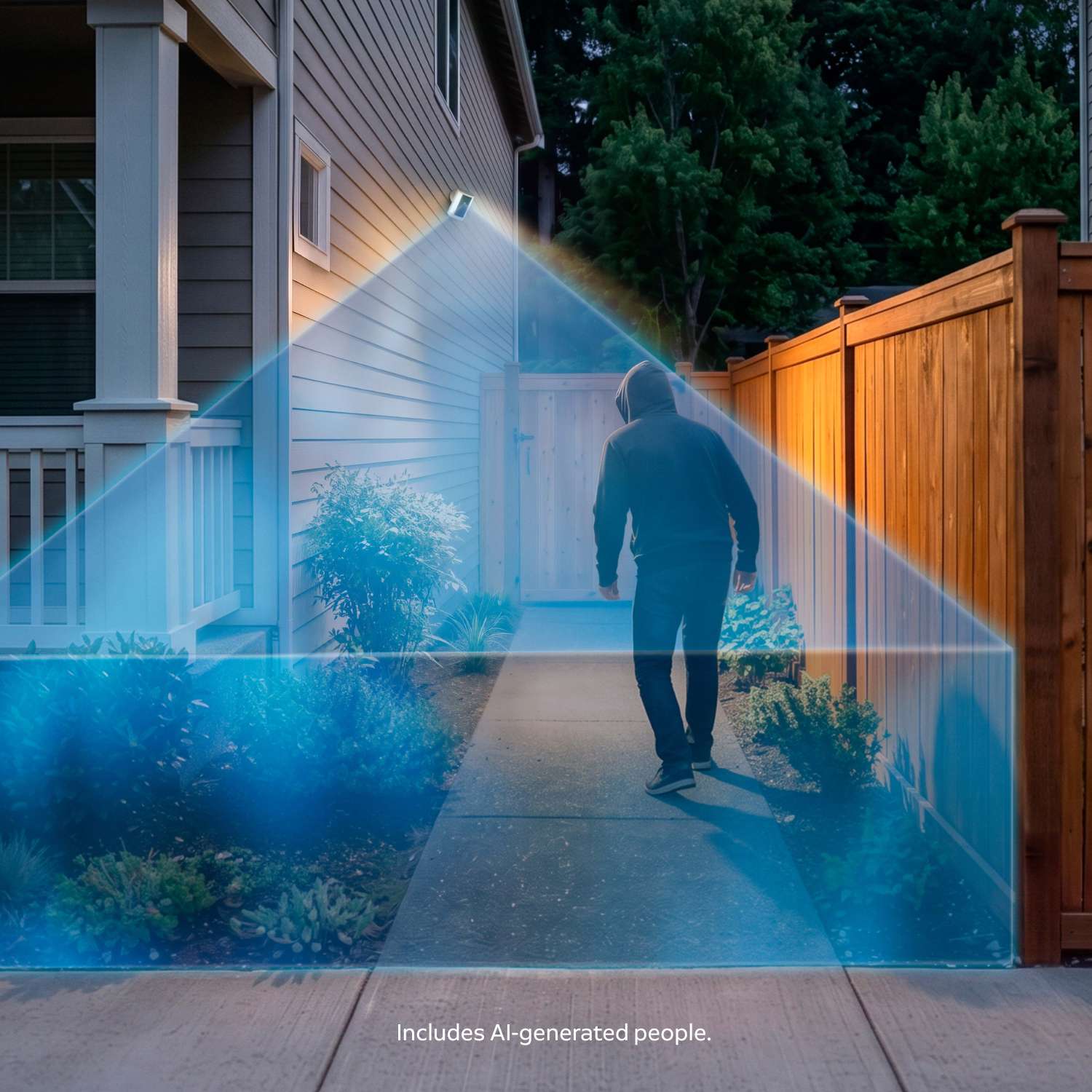 Night scene of a house side yard with a motion-activated floodlight illuminating a walkway as a hooded figure approaches a closed gate.
