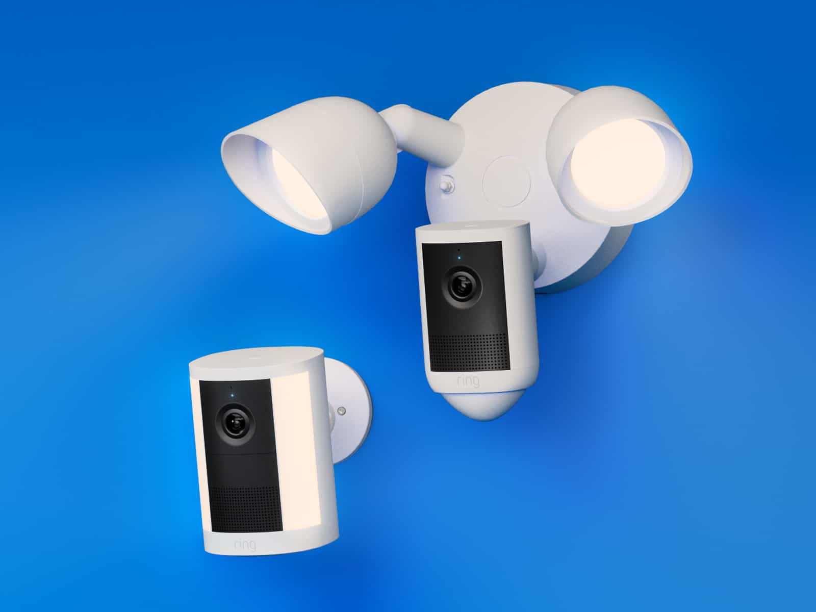 Two white Ring security cameras, one standalone and one with dual floodlights, mounted against a bright blue background.