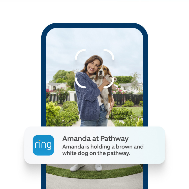 Ring app alert on a phone reads: “Amanda at Pathway. A person holding a brown and white dog on the pathway.