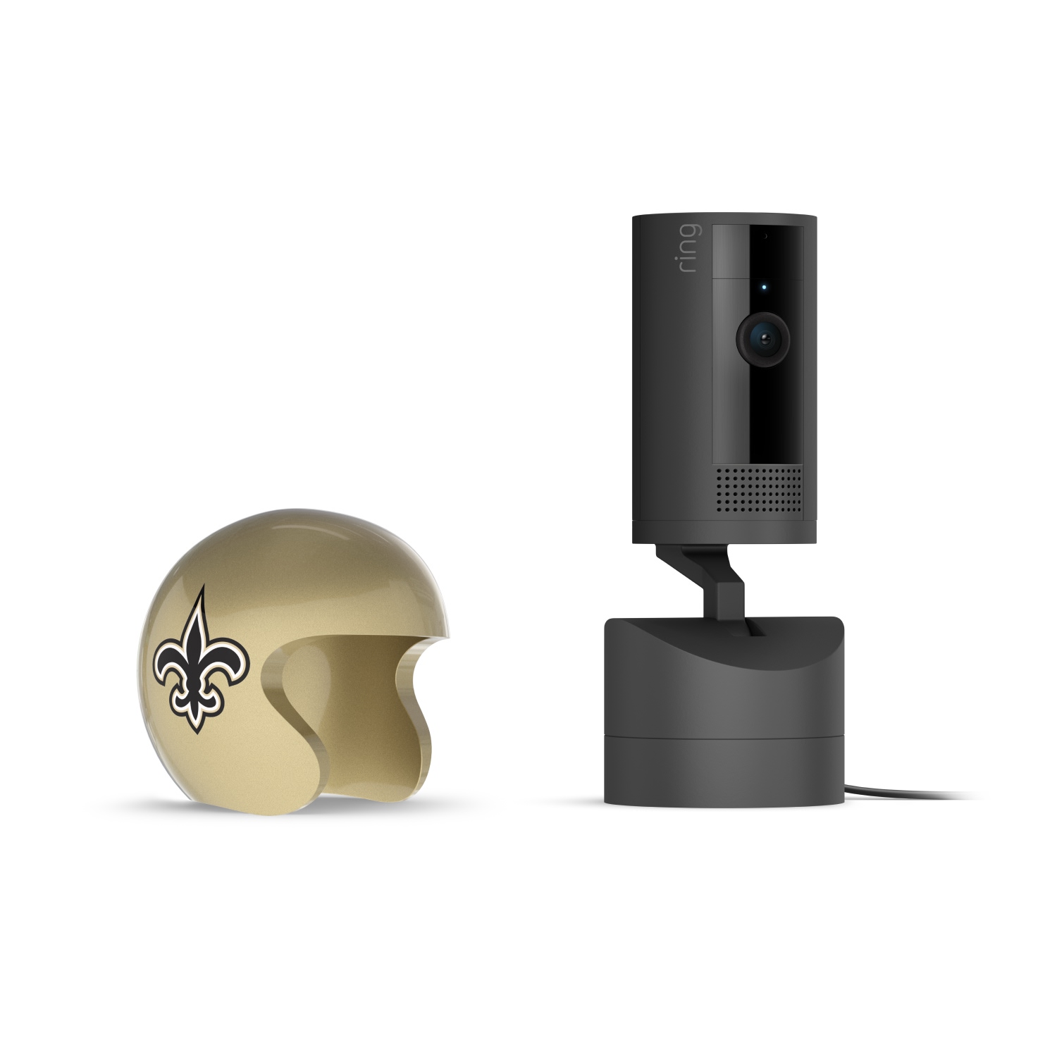 Pan-Tilt Indoor Cam, Black + NFL Game Day Cam Cover — NFC - Black Ring indoor camera on a small base next to a gold mini football helmet with a fleur-de-lis logo, on a white background.
