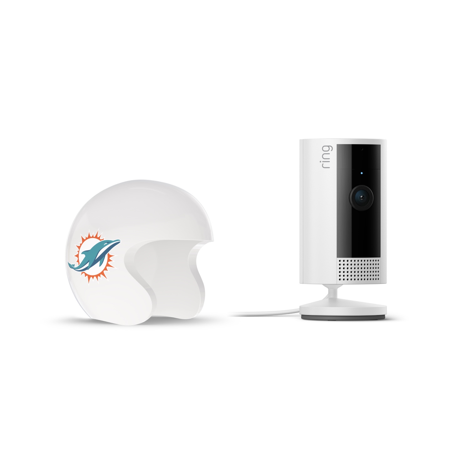 Indoor Cam, White + NFL Game Day Cam Cover — AFC - White Ring indoor camera on a stand next to a white mini football helmet with a teal dolphin logo on the side, set against a plain background.