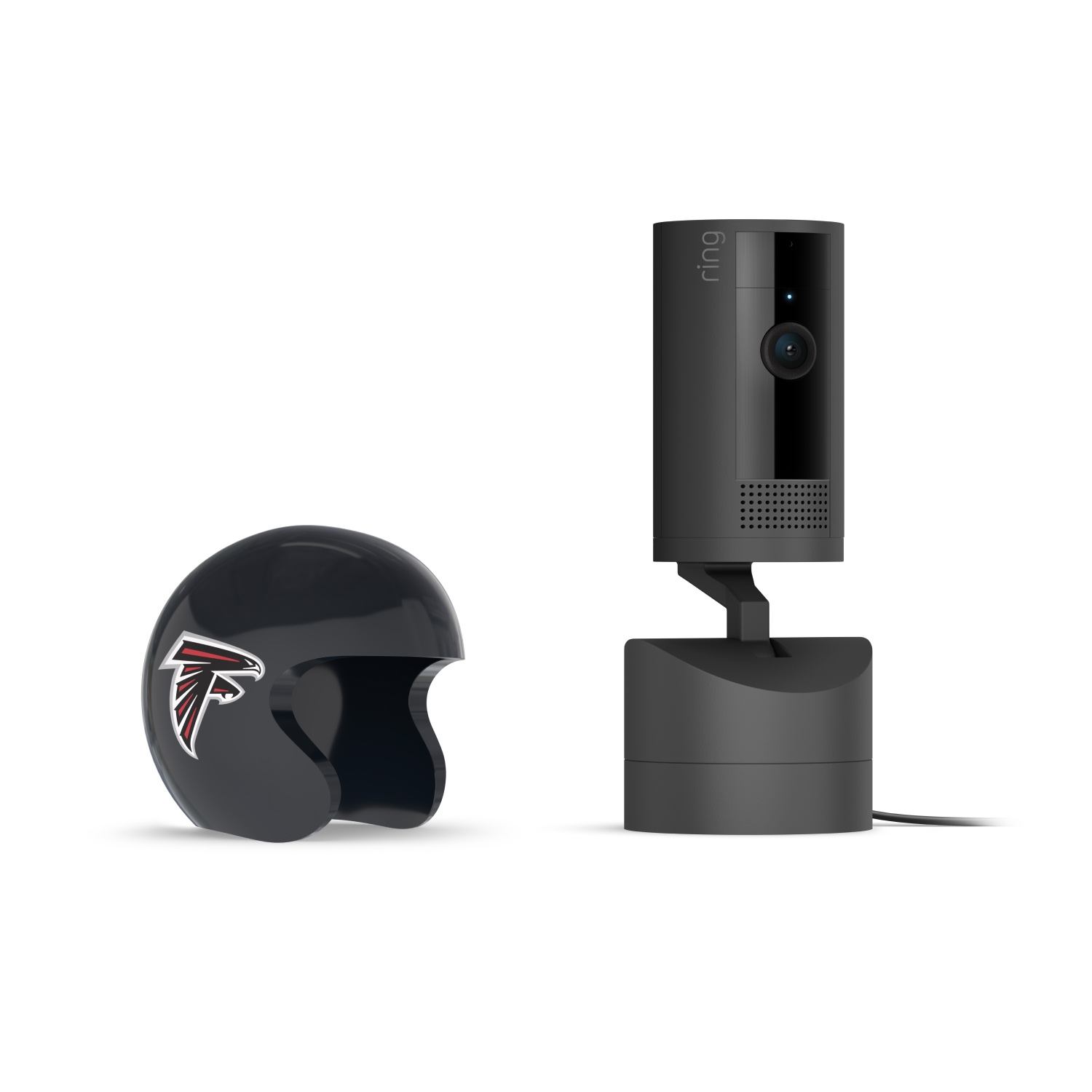 Pan-Tilt Indoor Cam, Black + NFL Game Day Cam Cover — NFC - Black Ring indoor camera on a stand beside a small black helmet with the Atlanta Falcons logo, against a white background.