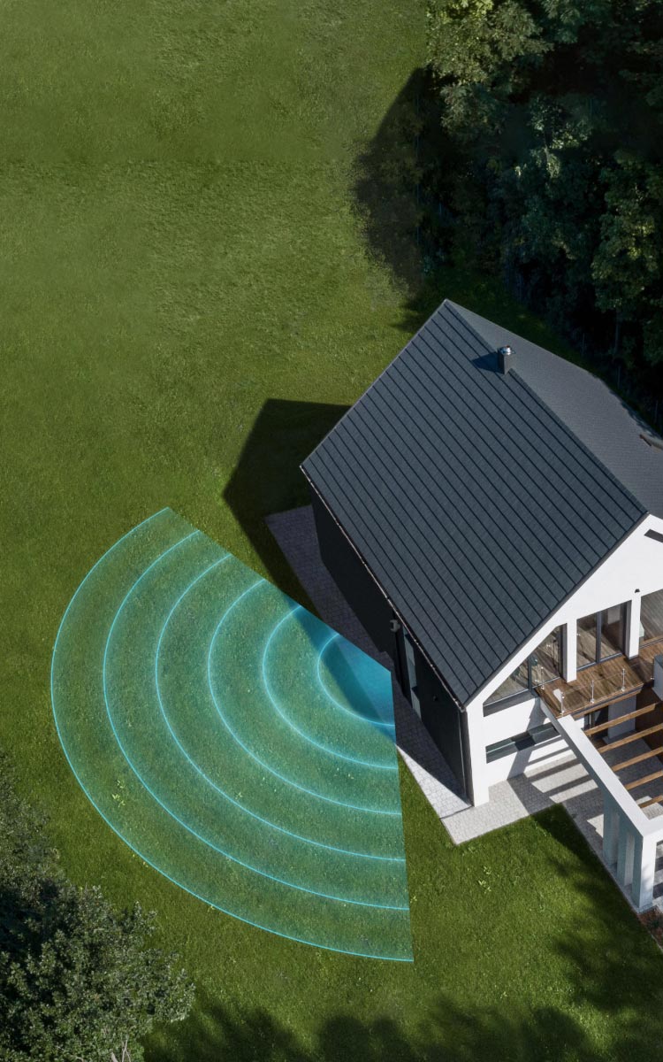 Outdoor birds eye view of 3D Motion Detection camera on a house detecting backyard surroundings.