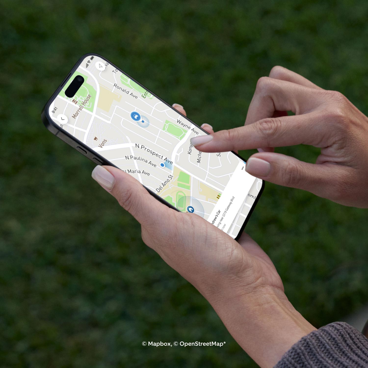 Car Alarm - A person views GPS tracking on the phone.