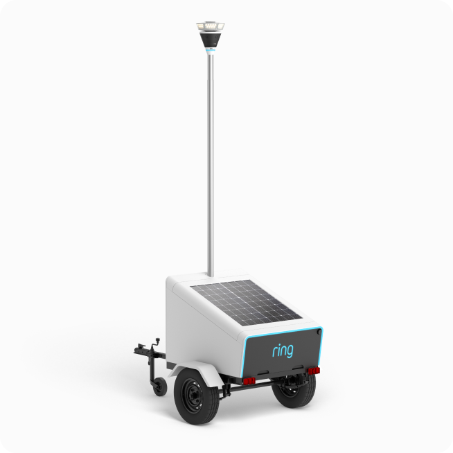 Ring mobile security device with solar panel, tall camera pole, and wheels for outdoor surveillance.