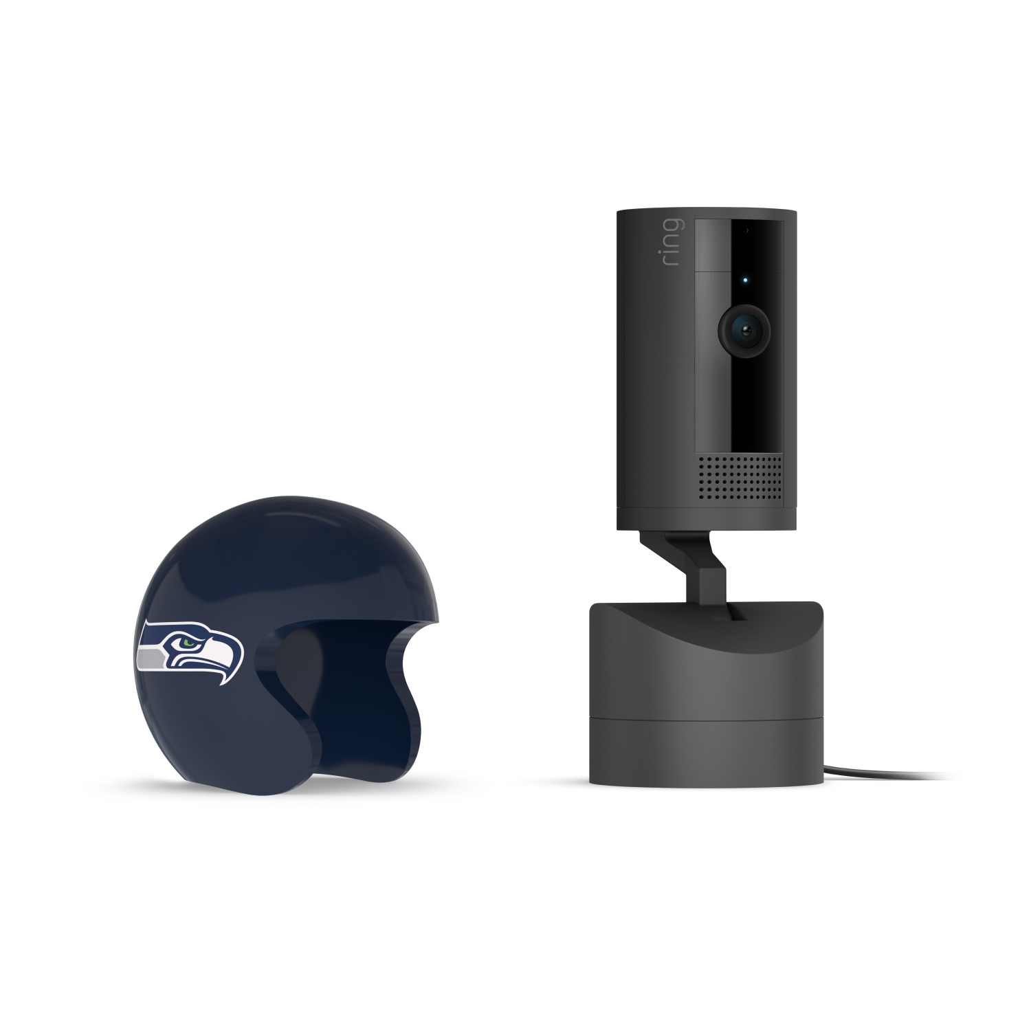Pan-Tilt Indoor Cam, Black + NFL Game Day Cam Cover — NFC - Black Ring indoor camera on stand with power cord, next to a dark blue mini football helmet featuring a hawk logo on white.