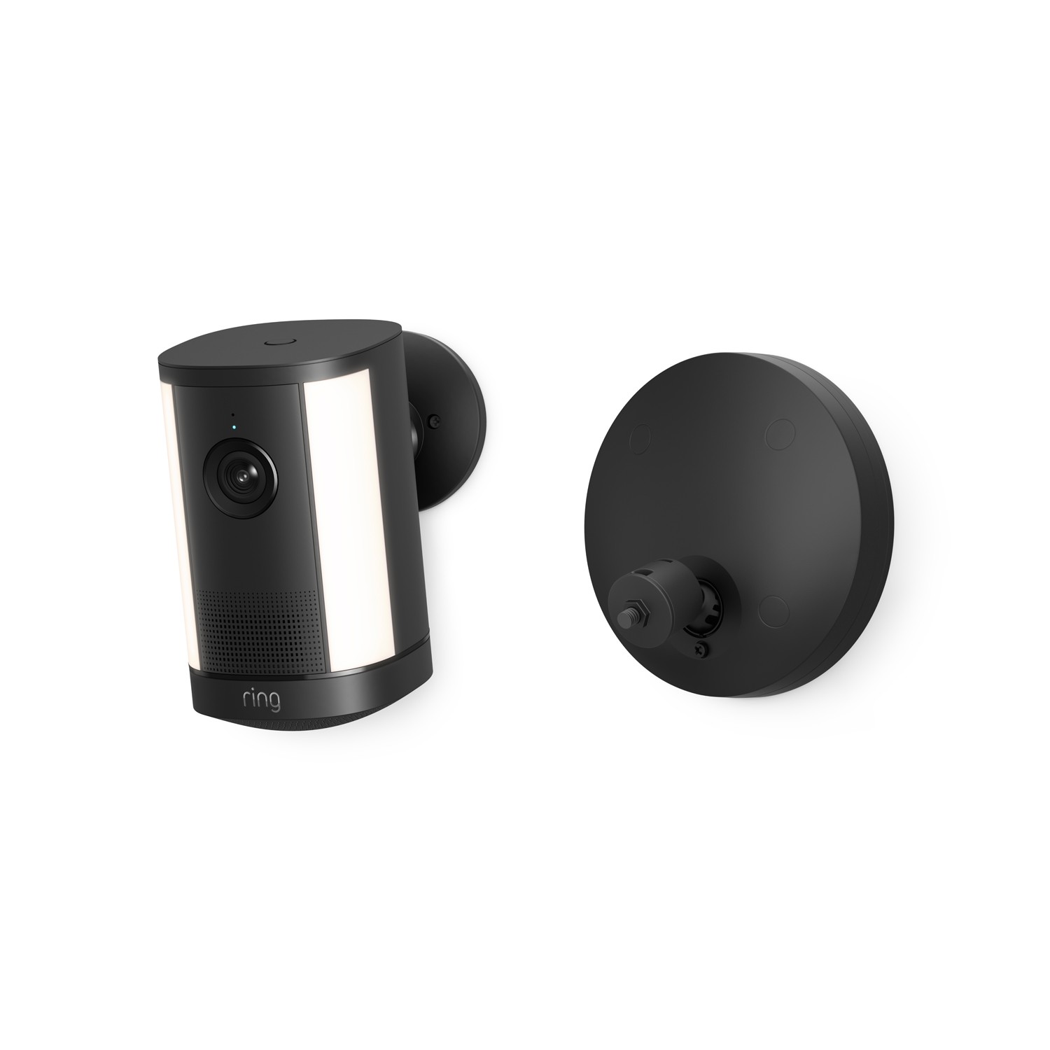 Spotlight Cam 4K Plus - Black wall-mounted smart camera with dual side lights and speaker grille, shown with separate round mounting plate on white background.