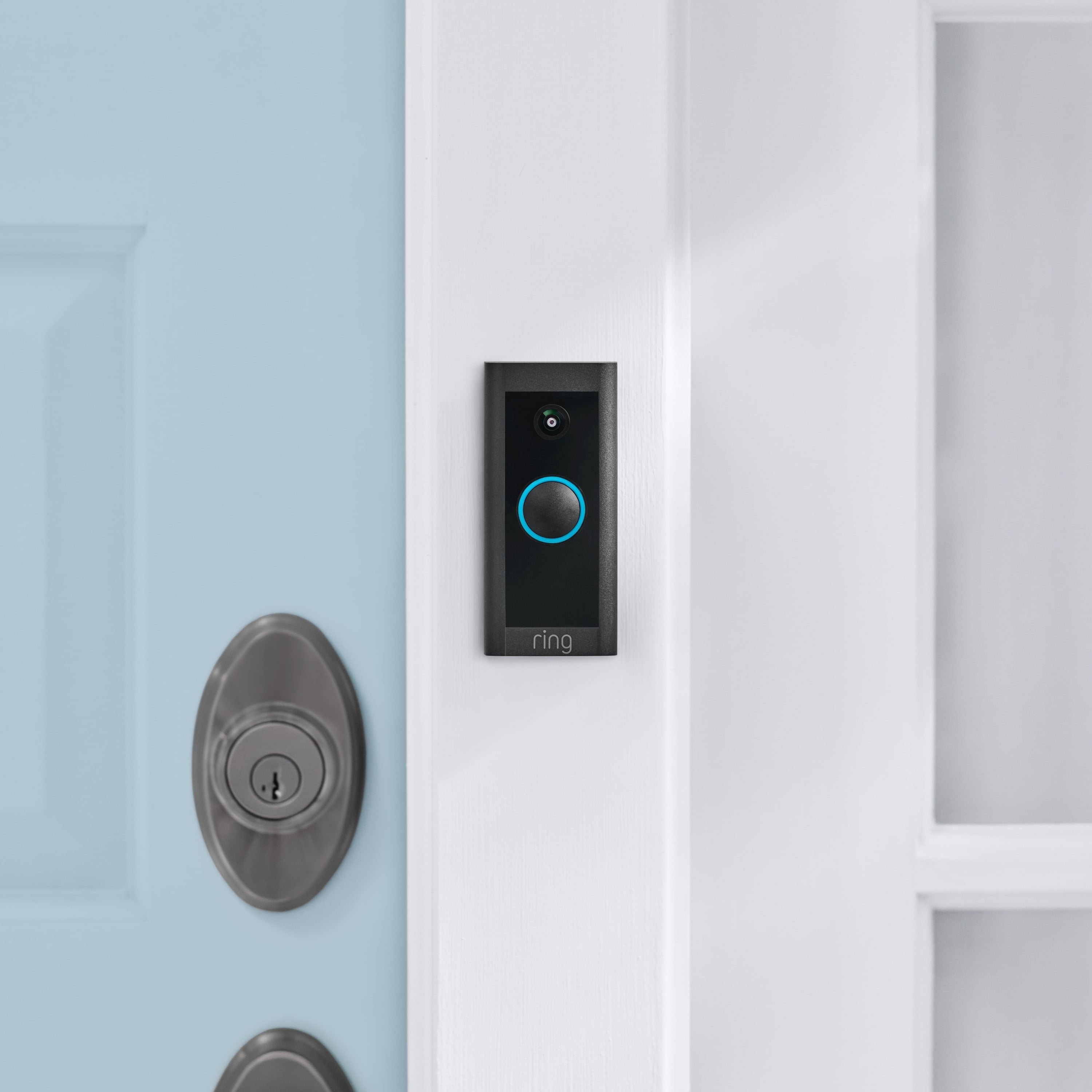 5-Piece Alarm Security Kit + Video Doorbell Wired (for 2nd Generation) - Video Doorbell Wired, 2nd Generation mounted to white door frame next to front door.