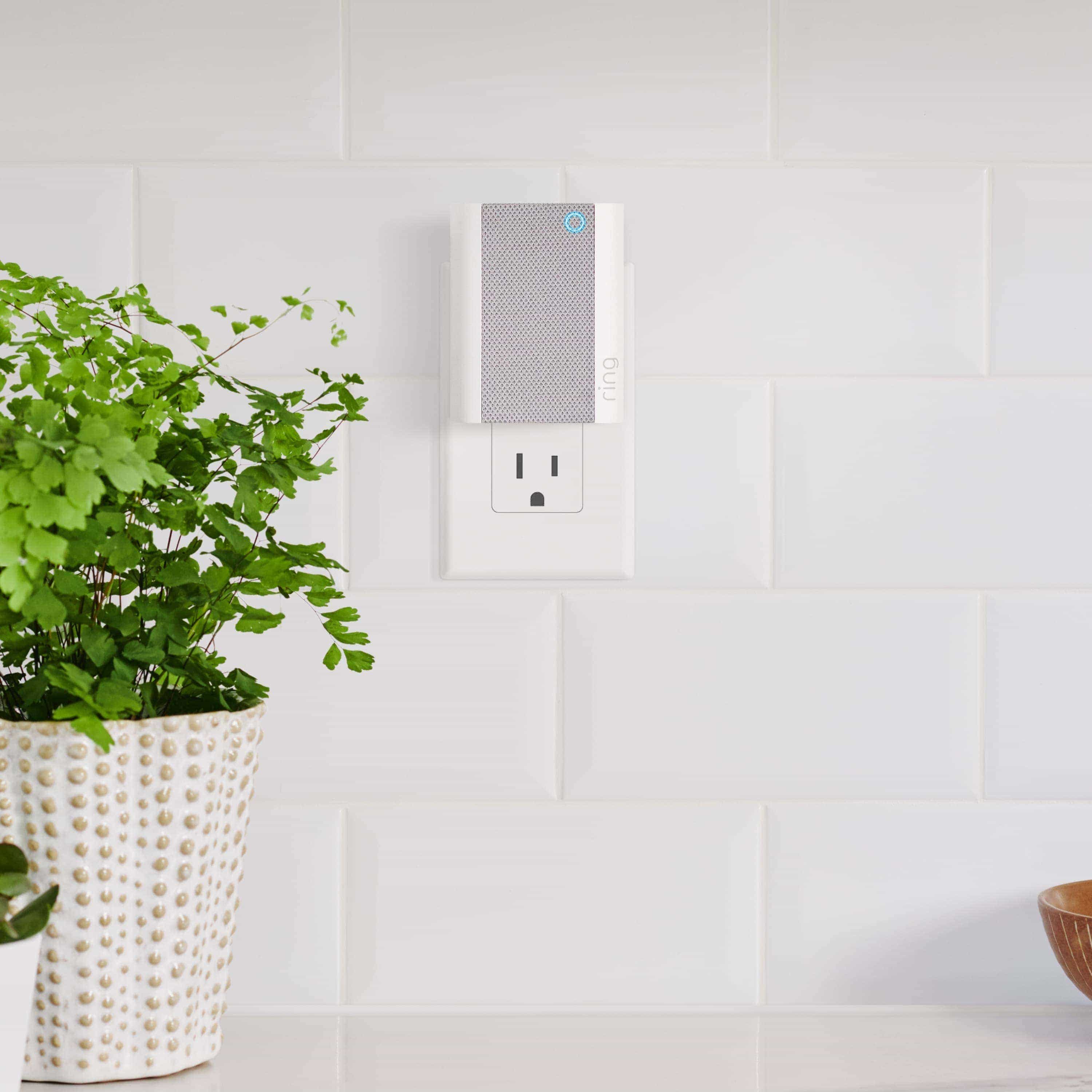 Video Doorbell with Chime (for 2nd Generation) - Ring Chime plugged into a kitchen wall outlet, next to a potted plant.