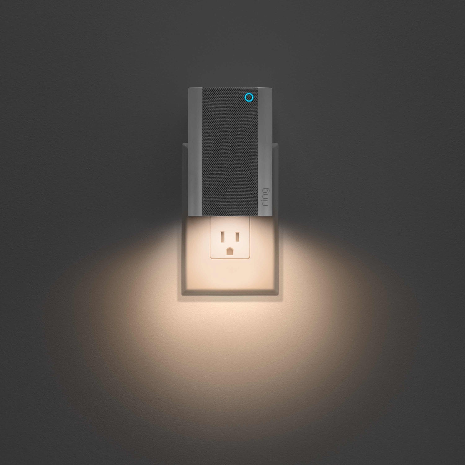 Chime Pro - Chime Pro plugged into an outlet with automatic nightlight shining below.
