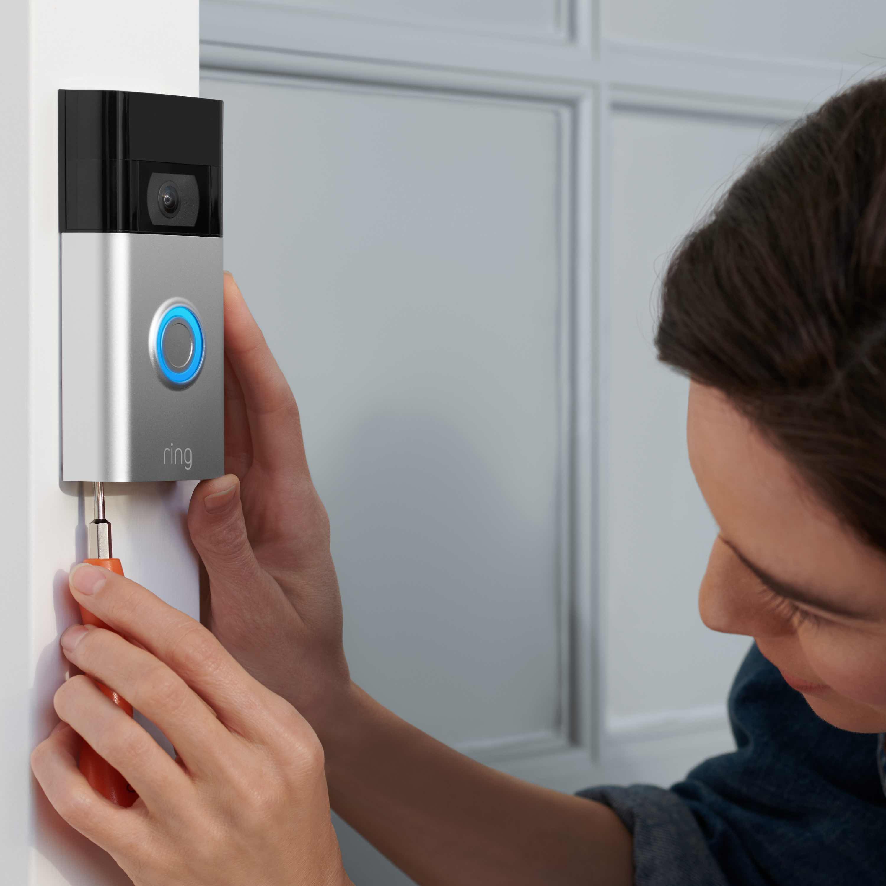 Video Doorbell (2nd Generation) (for Certified Refurbished) - Close up of person installing Certified Refurbished Video Doorbell 2nd Generation on door frame of home.
