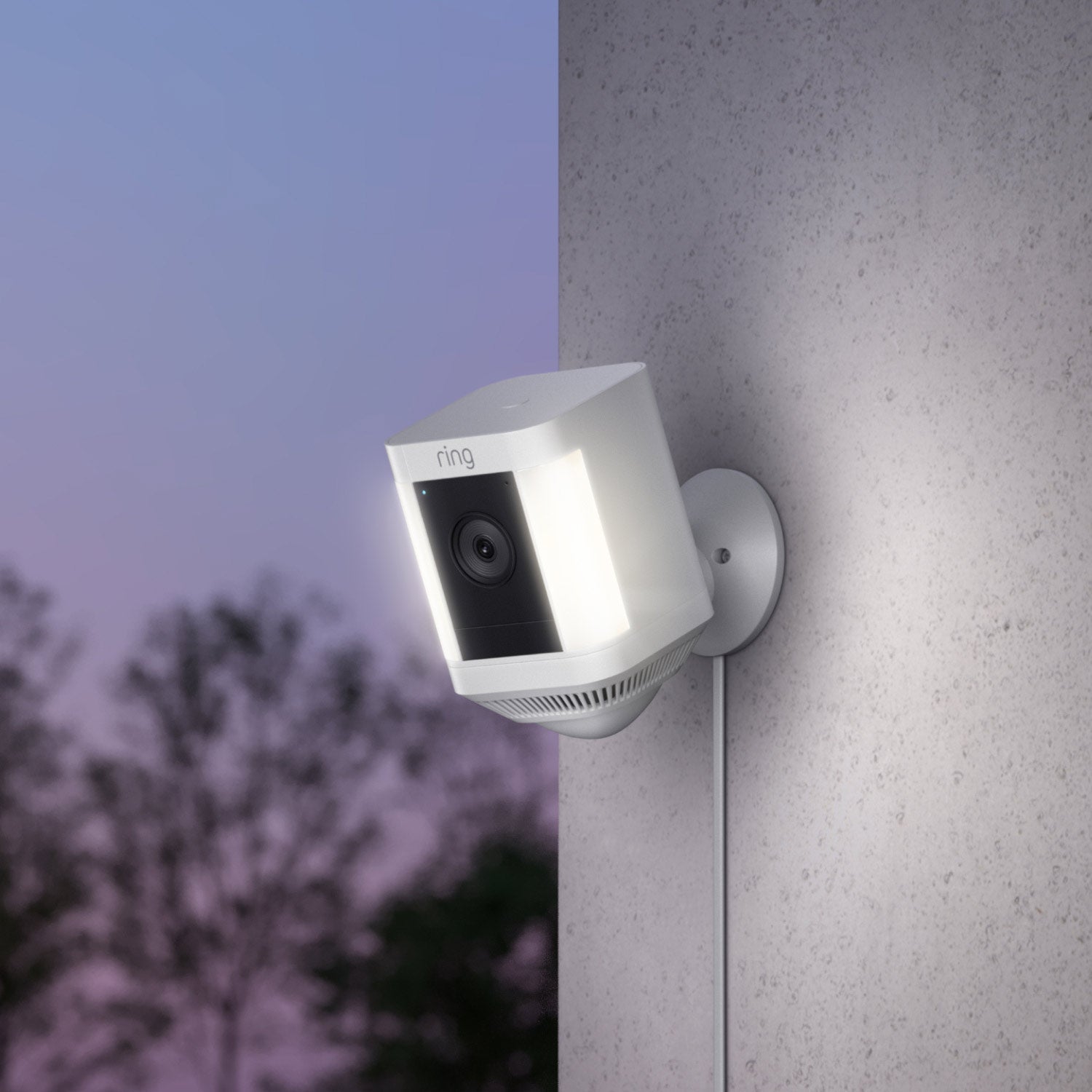 2-Pack Spotlight Cam Plus (Plug-In) - Spotlight Cam Plus, Plug-In model in white mounted on an exterior wall of home.