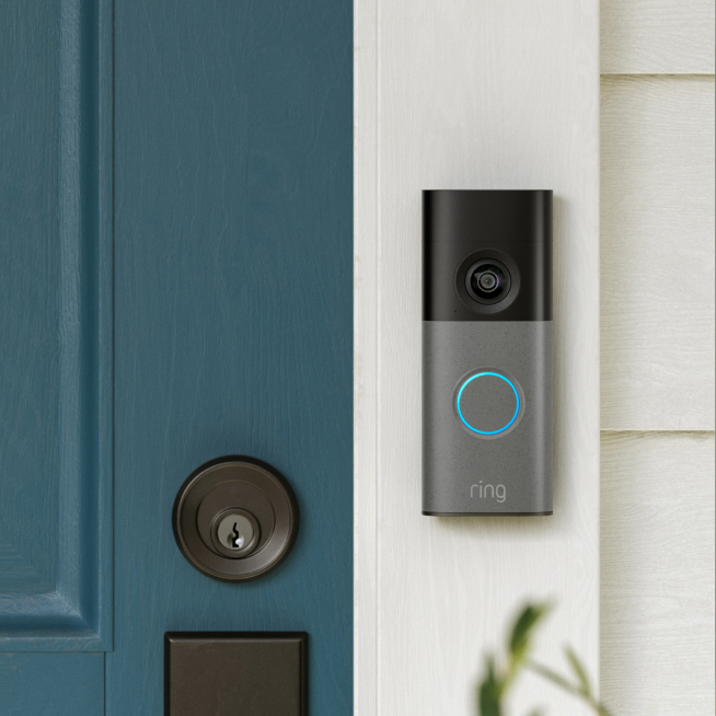 A close-up view of the new Wired Doorbell 2nd Gen mounted by the front door.