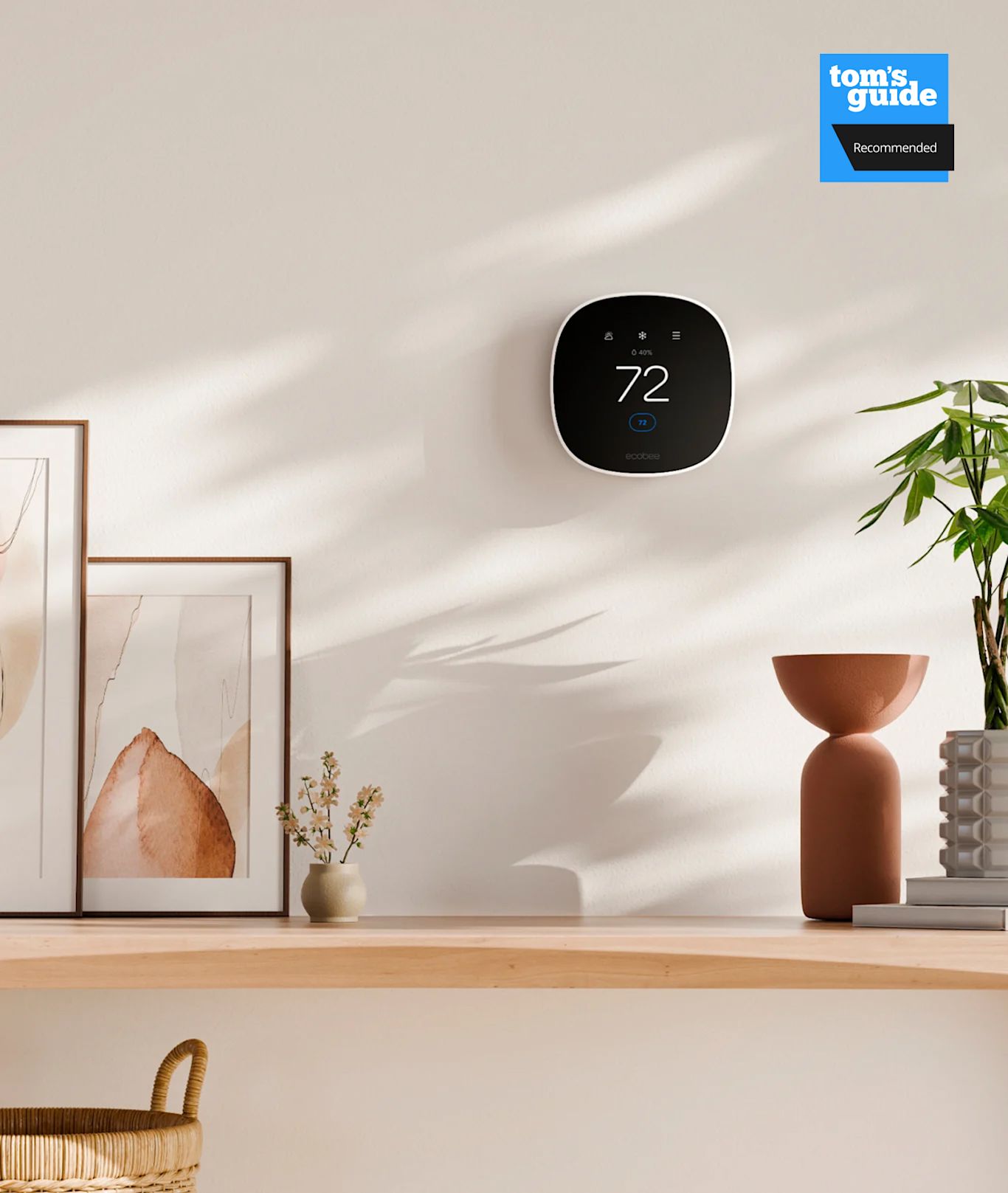 ecobee smart thermostat essential on a wall