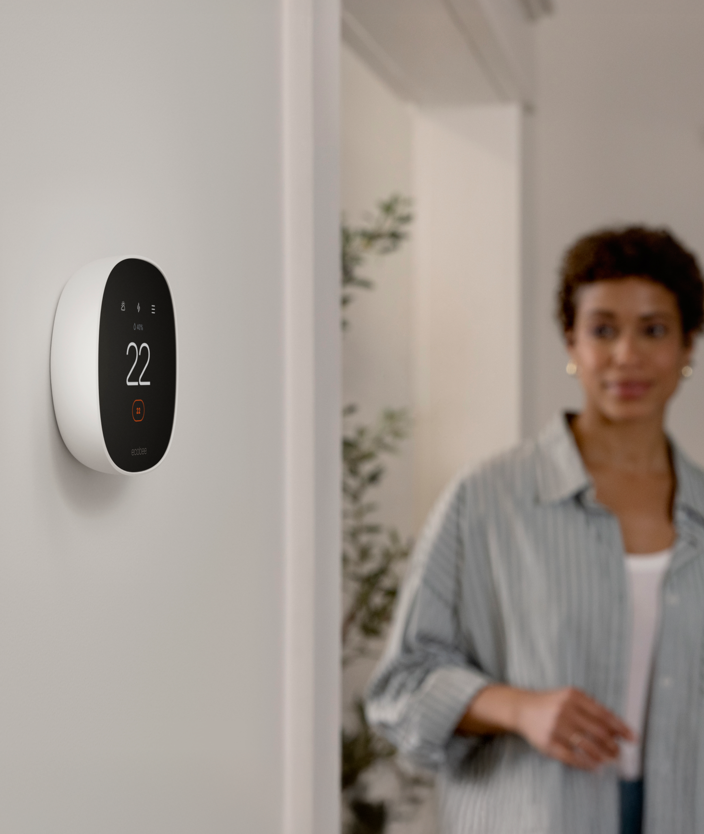 ecobee smart thermostat essential on a wall