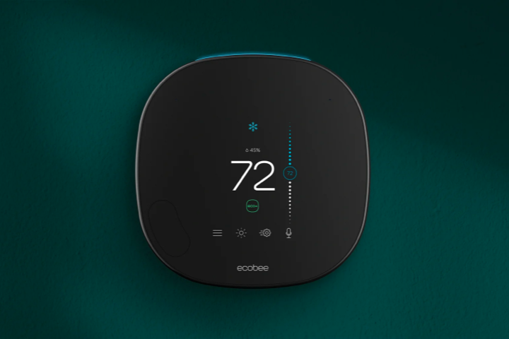 An ecobee thermostat on a green background.