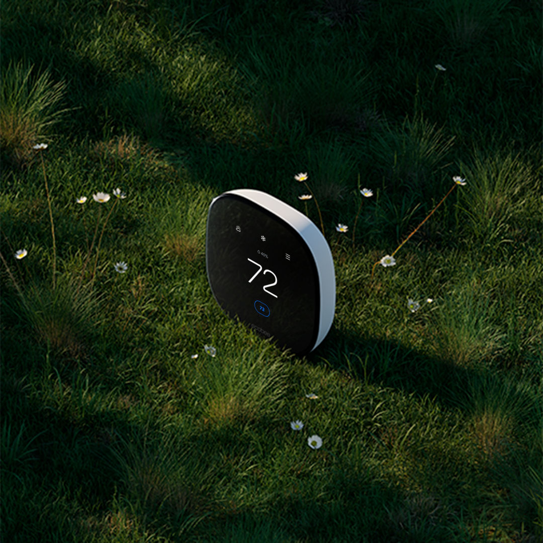 ecobee smart thermostat enhanced on a bed of grass