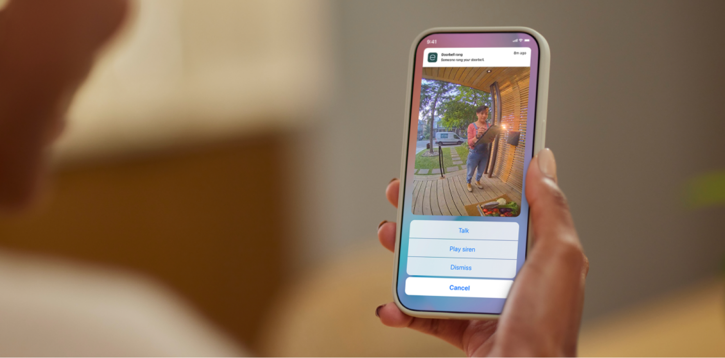 hand holding the a phone shows ecobee app view from the smart doorbell camera