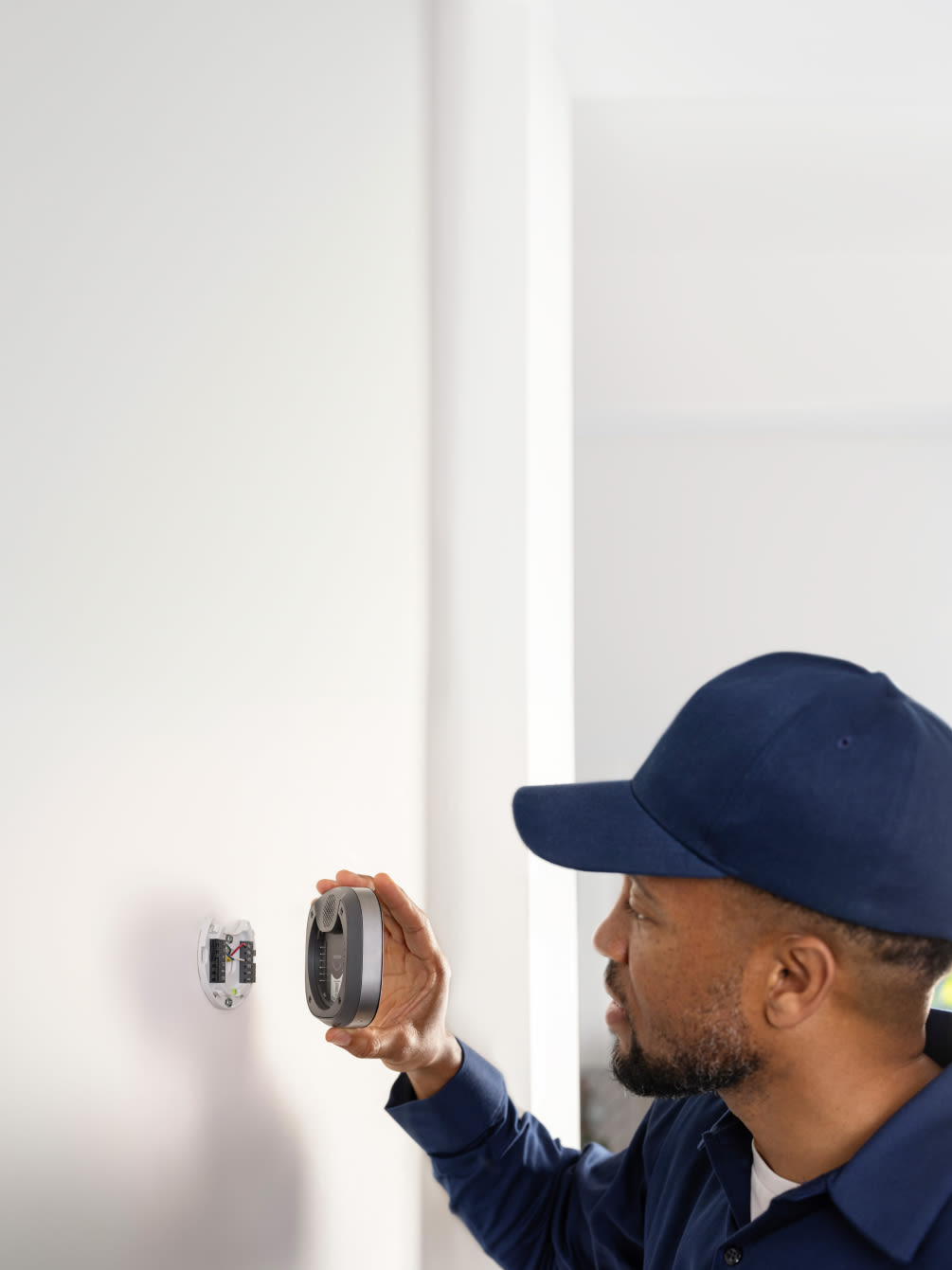 HVAC technician installs an ecobee thermostat