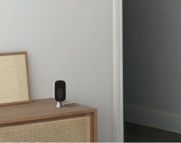 an ecobee SmartCamera sits on a table.