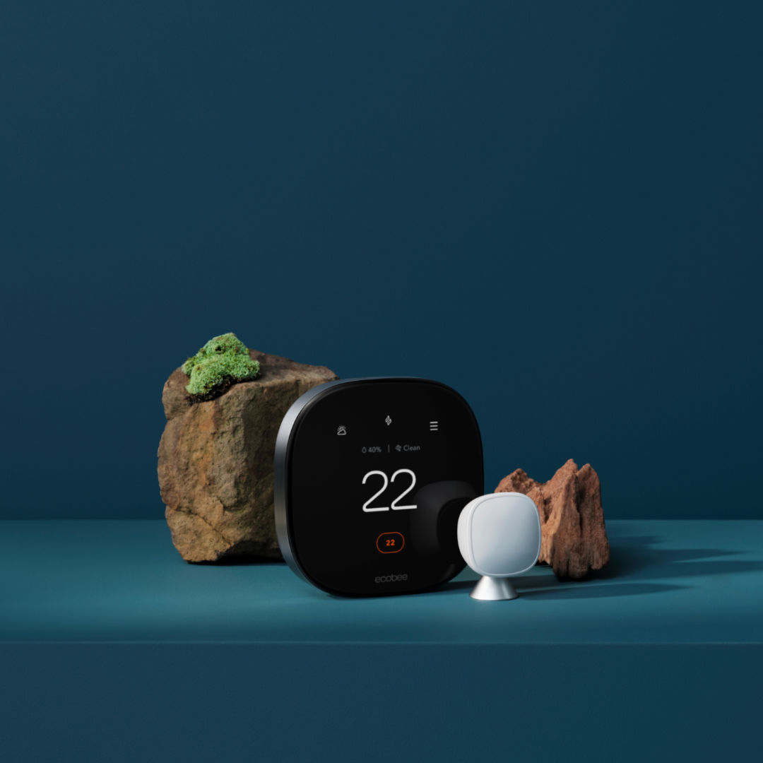 ecobee Smart Thermostat Premium and sensor on a blue background