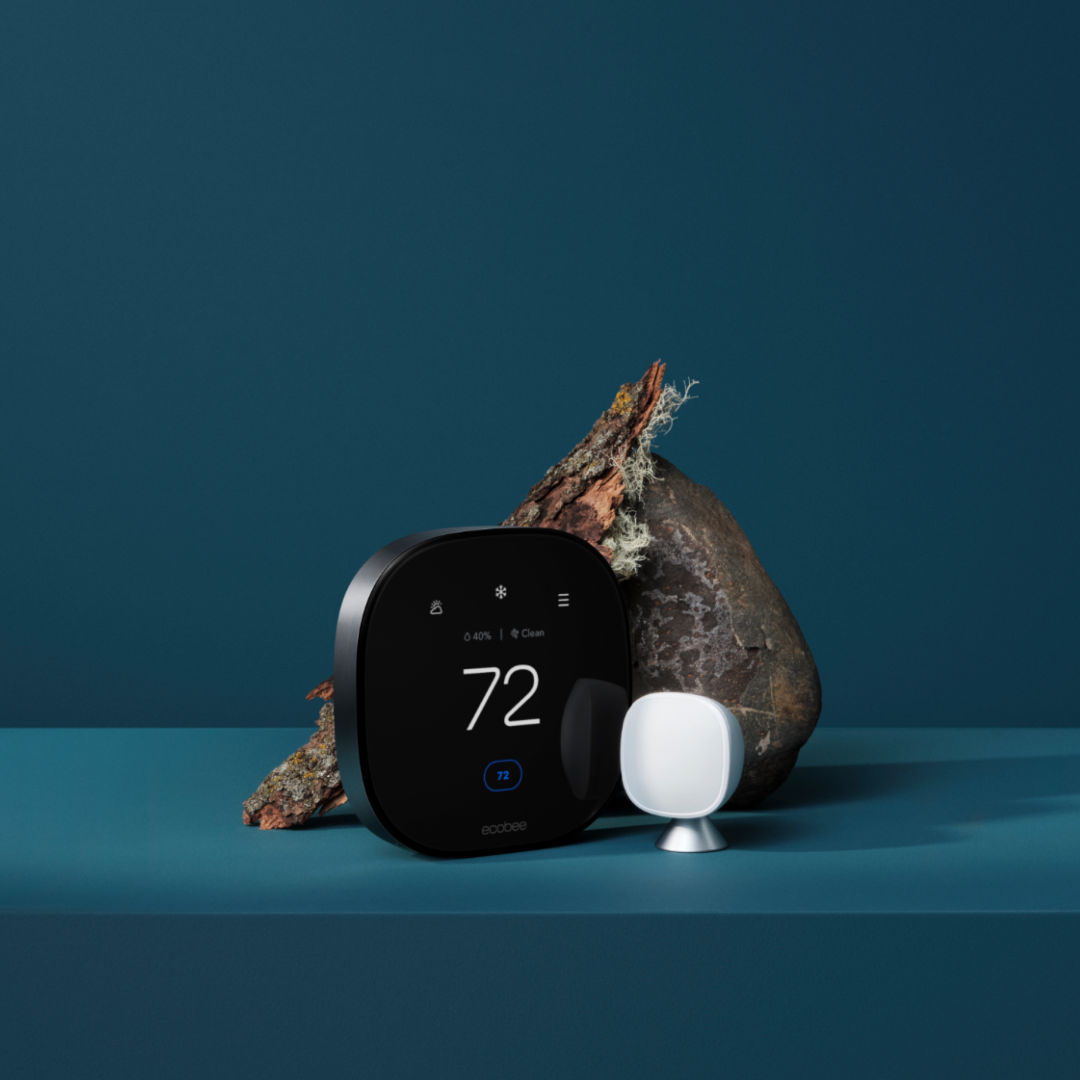 ecobee Smart Thermostat Premium and sensor on a blue background