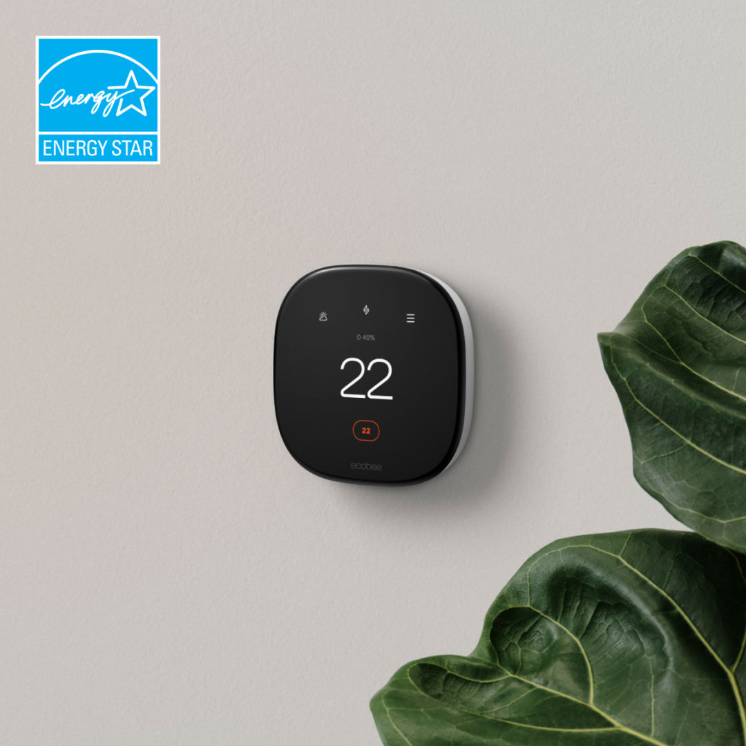 ecobee Smart Thermostat Enhanced on a wall with the Energy Star logo