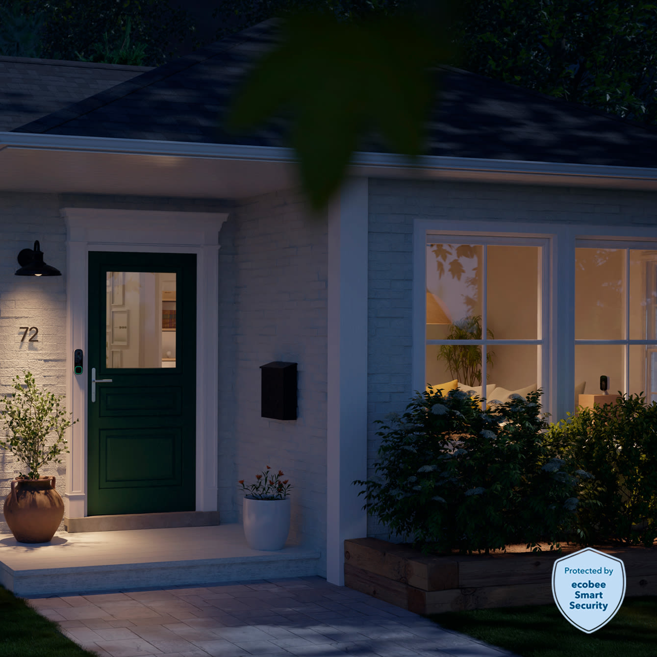 the front step of a house at night with the ecobee smart security badge