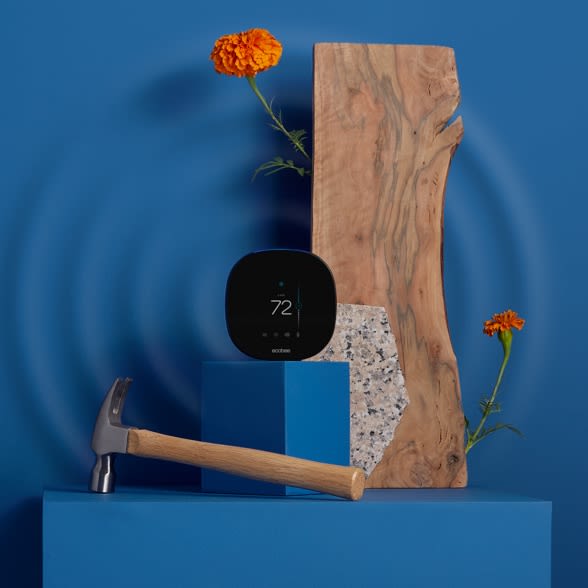 ecobee SmartThermostat with voice control on a blue background