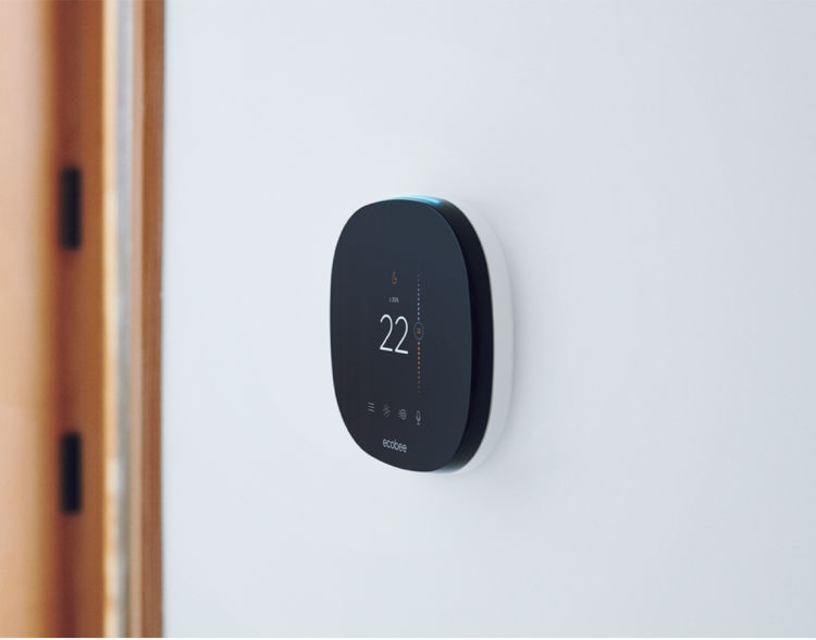 An ecobee SmartThermostat mounted on a wall.