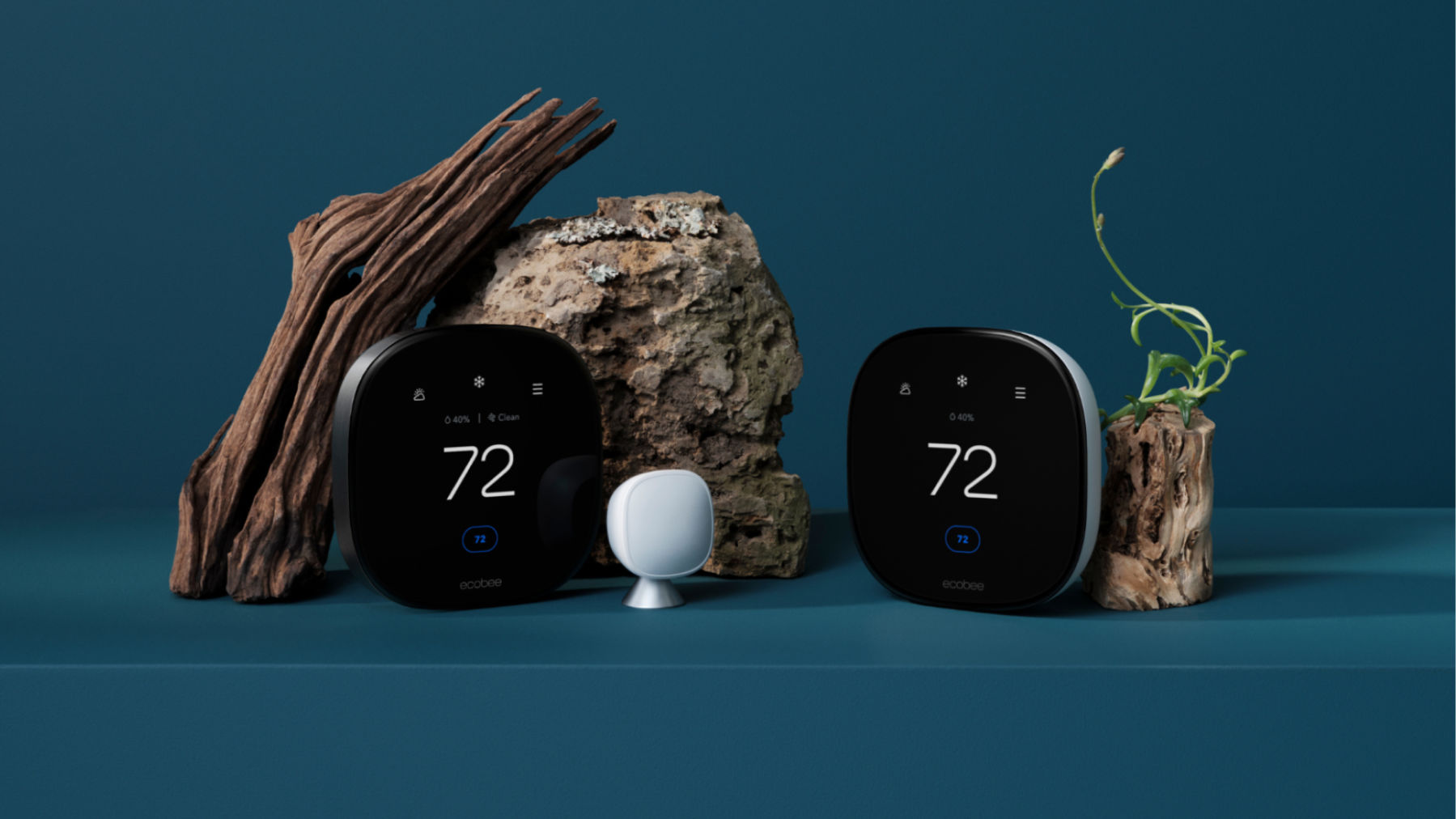 ecobee Smart Thermostat Premium and Smart Thermostat Enhanced in front of a blue background.