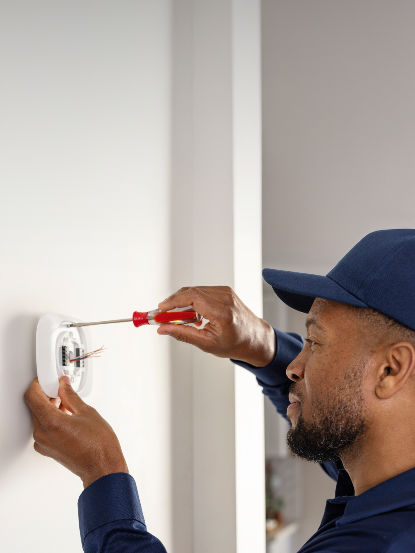 A pro technician installs a trim kit