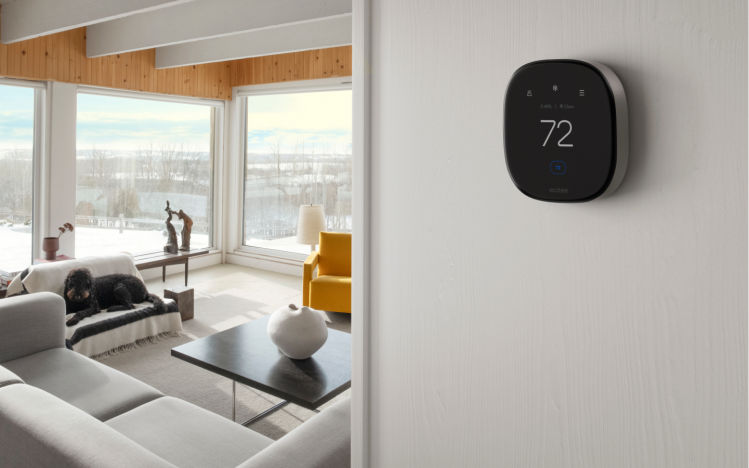 Smart Thermostat Premium on a wall in a minimalist looking home.