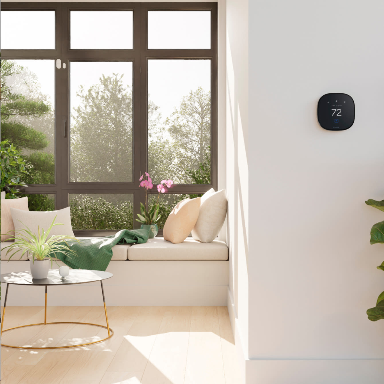 ecobee thermostat on a wall in a living room
