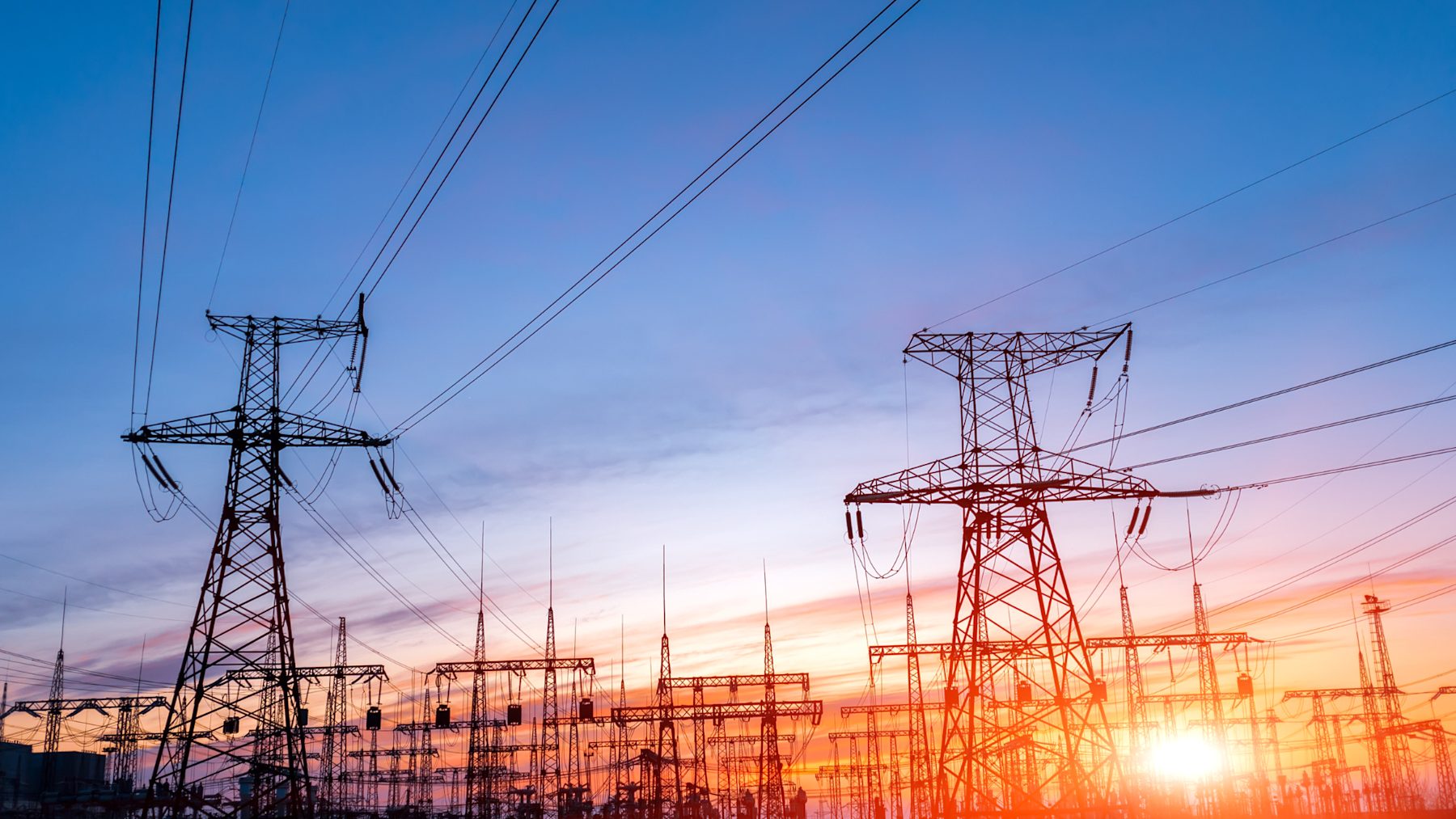 Electrical power grid at sunset.
