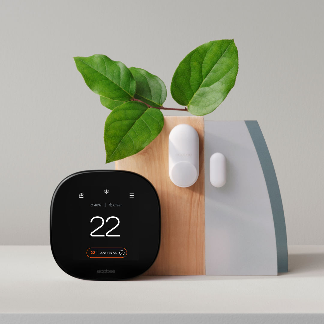 Illustration of an ecobee smart thermostat with a leaf overlapping