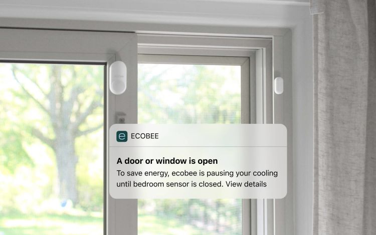 Image of phone showing Pause When Open notification via ecobee Smart Security