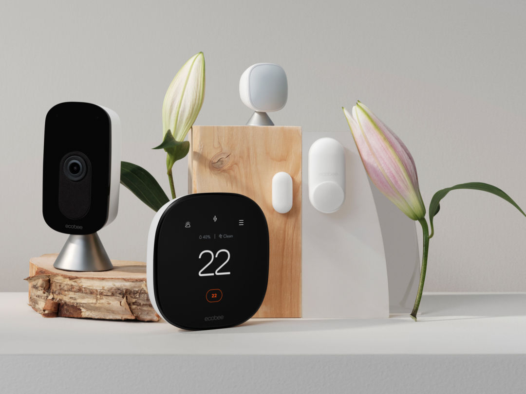 ecobee products on a grey background with flowers