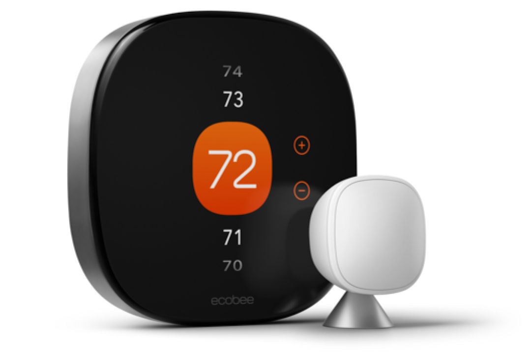 An ecobee thermostat displaying the temperature and indicating that the heat is on.